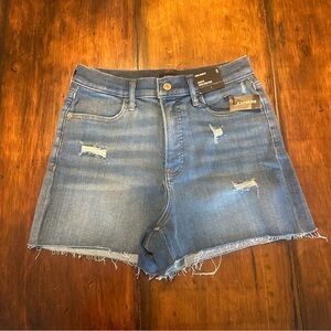 Super high rise Mom shorts. Distressed High-Rise Jean Shorts in Blue